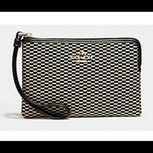 Coach Legacy jacquard fabric corner zip wristlet Style F13311.